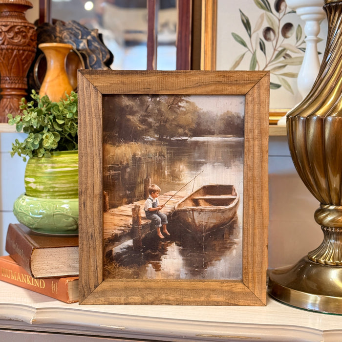Boy & Boat Framed Print
