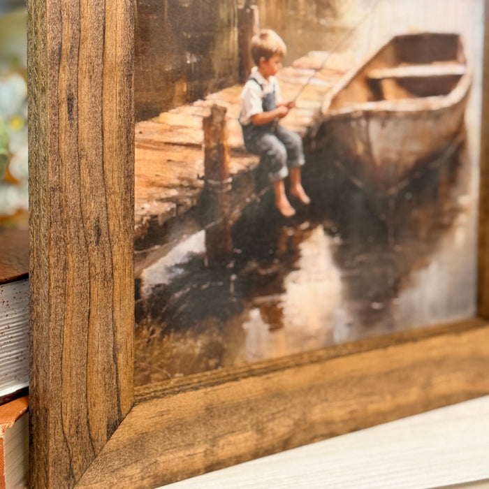 Boy & Boat Framed Print