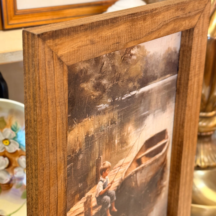 Boy & Boat Framed Print