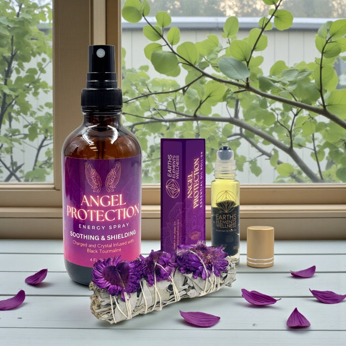 Angel Protection energy spray and other products on a windowsill with purple flowers.