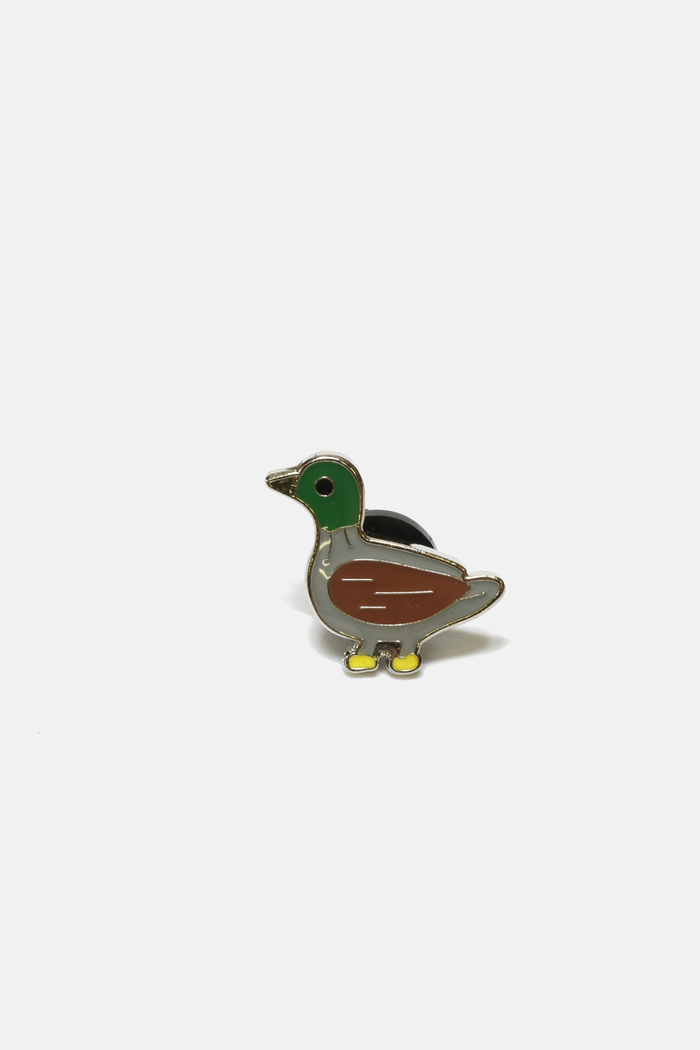 Curated Basics Duck Pin set featuring colorful, playful rubber pins ideal for collection or decoration.