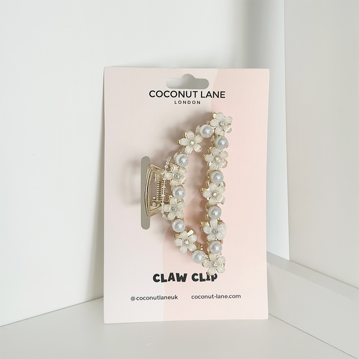 Flowers & Pearls Claw Clip with floral and pearl accents on a Coconut Lane card, white background.