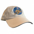 Beige cap with emblem on a wooden surface