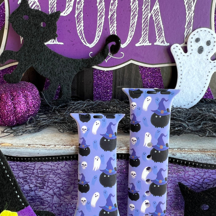 Ghostly Whisker's Apple Watch band turned to show the white ghost and skull side of the lavender Halloween print.