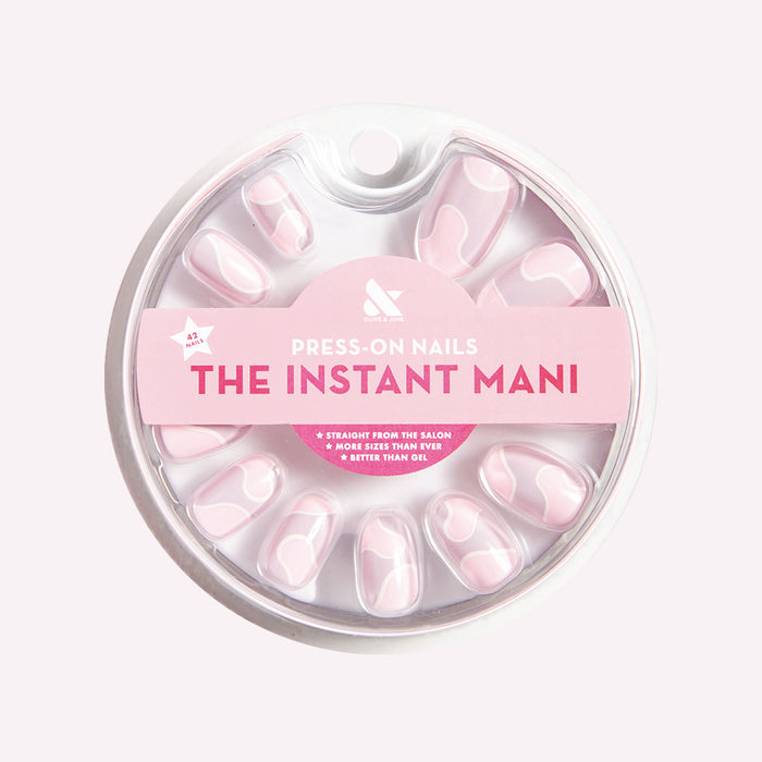Groovy Swirl - Press-On | Short | Round pink and lavender swirl false nails for a fun, easy at-home mani.