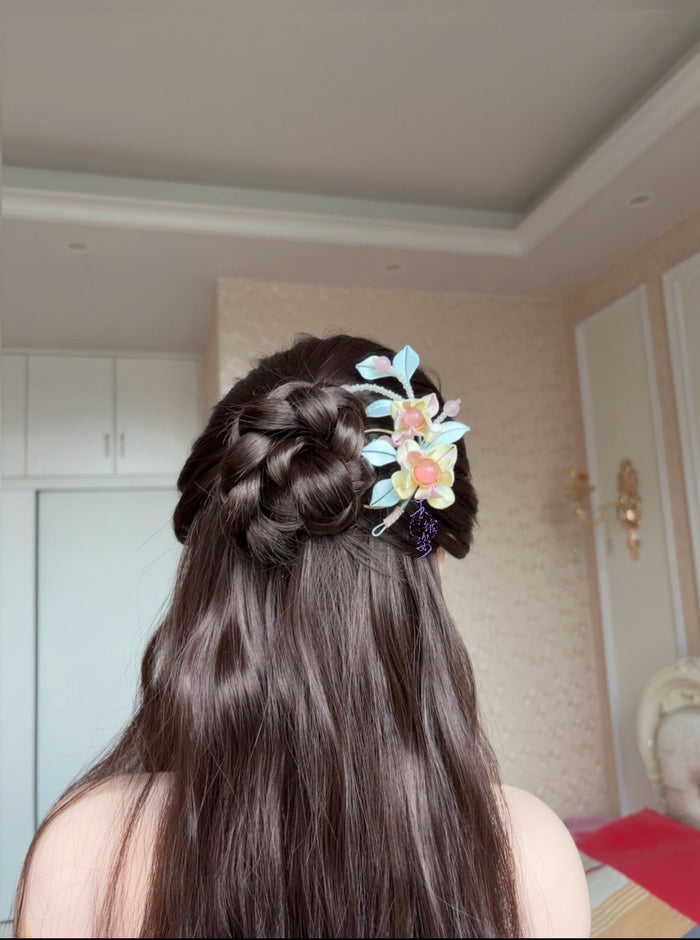 Pink - blue handmade Chanhua hairpin adorning a woman's hairstyle-5
