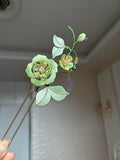 A handmade Chanhua peony hairpin with green petals and leaves-3