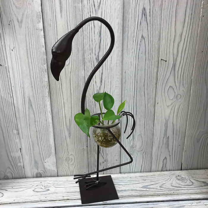Hydroponic home décor with industrial iron and wood frame, glass tubes for plants, minimalistic floral display stand