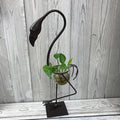 Hydroponic home décor with industrial iron and wood frame, glass tubes for plants, minimalistic floral display stand
