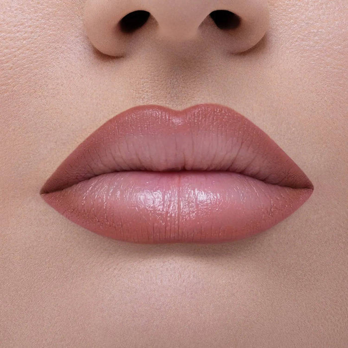 I Need a Nude Lip Crayon shade 'Emily' model look.