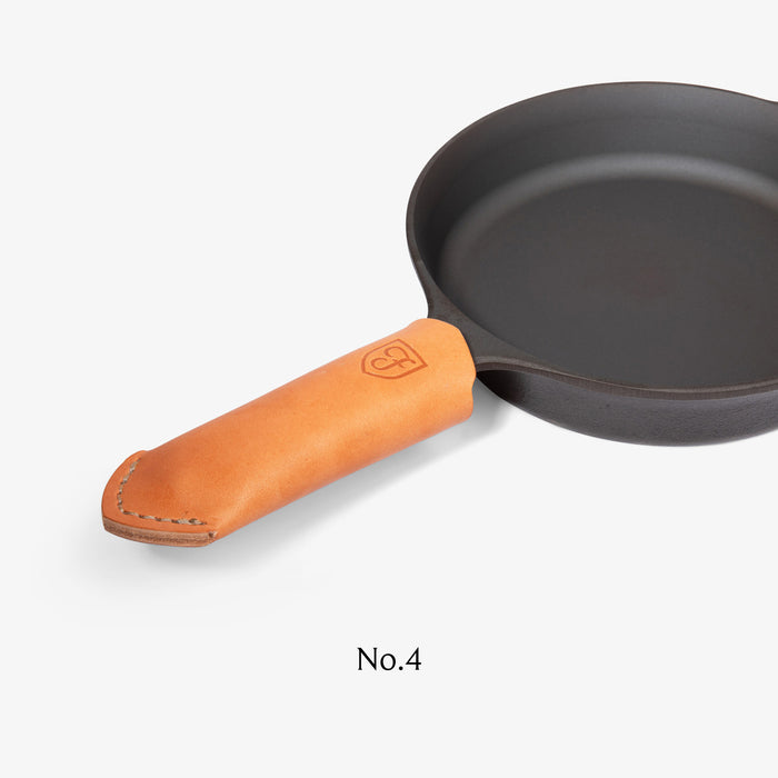 Tan Field Leather Handle Cover on a No.4 skillet handle, with the label No.4 below