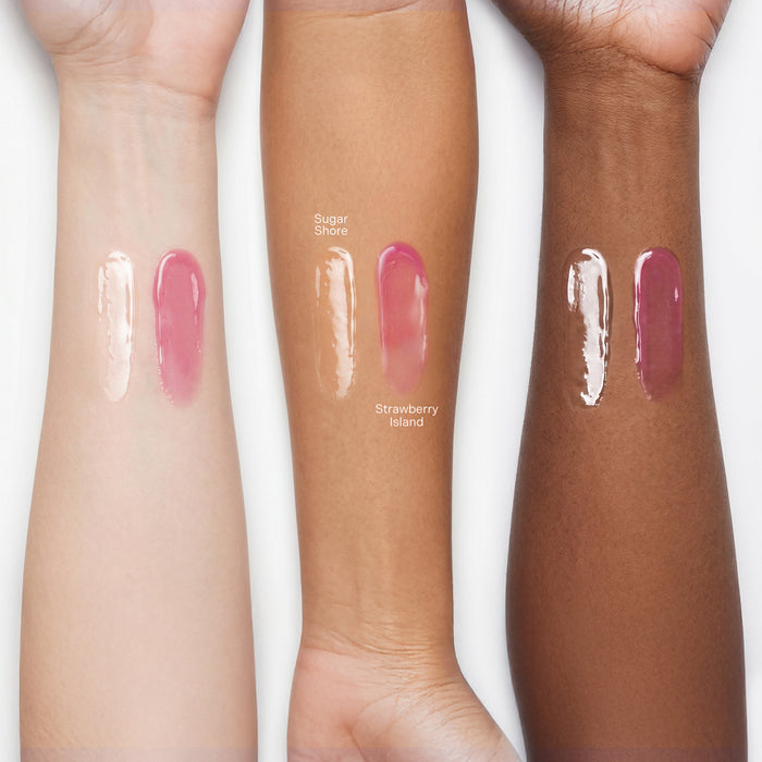 Lip gloss swatches on 3 different skin tones