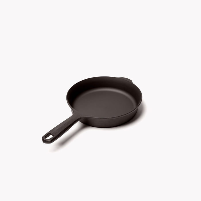 No.4 Field Cast Iron Skillet angled view with handle in the foreground, showing the hanging hole