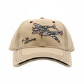 Beige cap with airplane design and 'P-38 Lightning' text on a dark surface