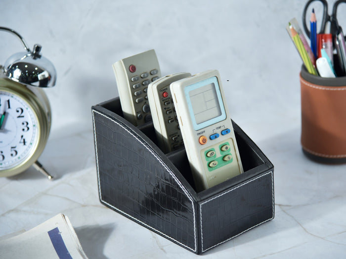 Black croc-texture remote holder with 3 compartments; holds multiple remotes