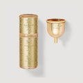 Gold Engraved 50ml Refillable Travel Perfume Atomiser with Funnel - Flat Lay | Creed Fragrances