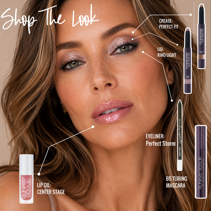portrait of a woman wearing Runway Rogue long lasting Eyewakening eyeshadow stick in the shade Ring Light, a neutral mauve color with silver shimmer and other Runway Rogue products to complete the look
