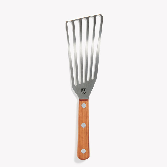 Right-handed Field Slotted Turner with slotted stainless blade and riveted wood handle on a white background