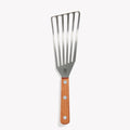 Right-handed Field Slotted Turner with slotted stainless blade and riveted wood handle on a white background