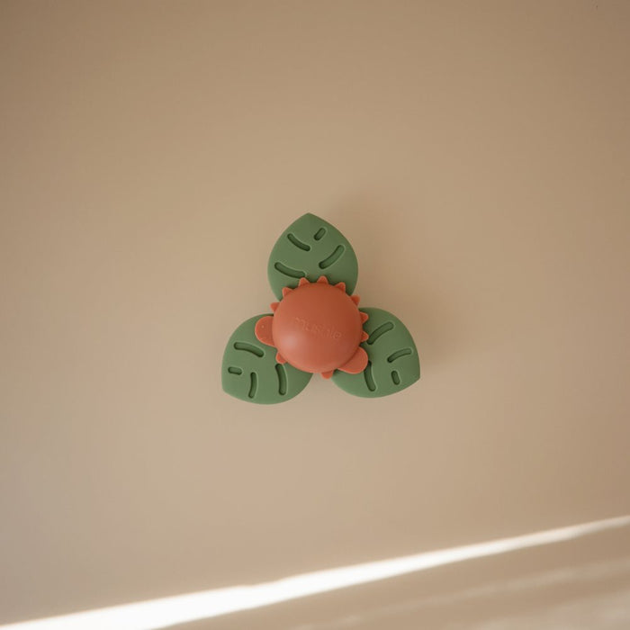 Mushie - Suction Spinner Toy - Dinosaurs - Lifestyle Cut 1