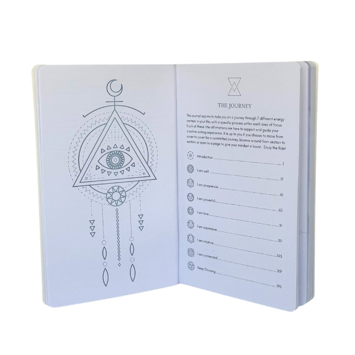 Open book with mystical symbols and text on a white background