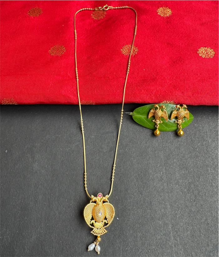 The Yashvi Silver Gandaberunda Pendant & Earrings (Pearl)