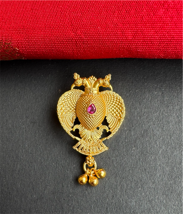 The Yashvi Silver Gandaberunda Pendant & Earrings