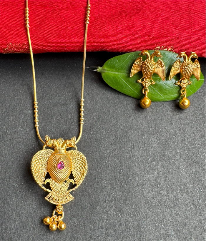 The Yashvi Silver Gandaberunda Pendant & Earrings