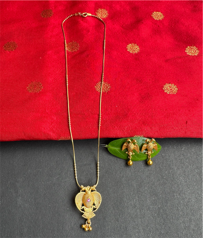 The Yashvi Silver Gandaberunda Pendant & Earrings