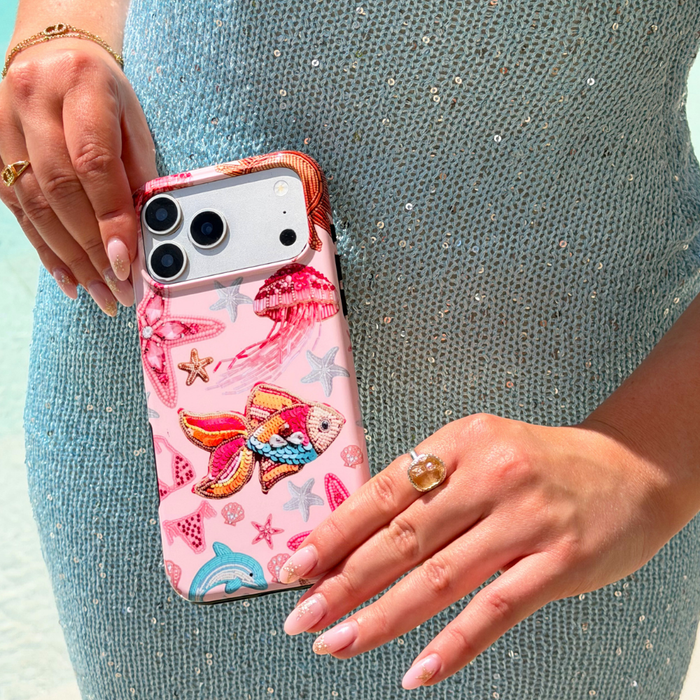 Girl holding Tough MagSafe Pink Paradise Phone Case