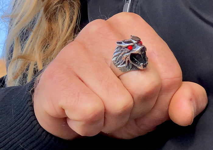 Close-up of Wolf Head Bottle Opener Ring - Stainless Steel with Red Eyes detail